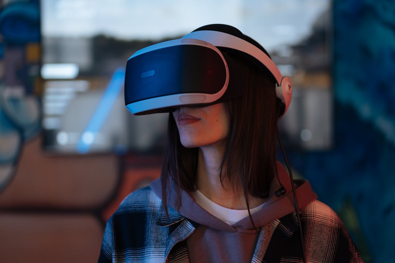 Young woman exploring virtual reality with VR headset indoors, surrounded by colorful lights.
